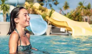 Girl in pool at Siblu Les Embruns